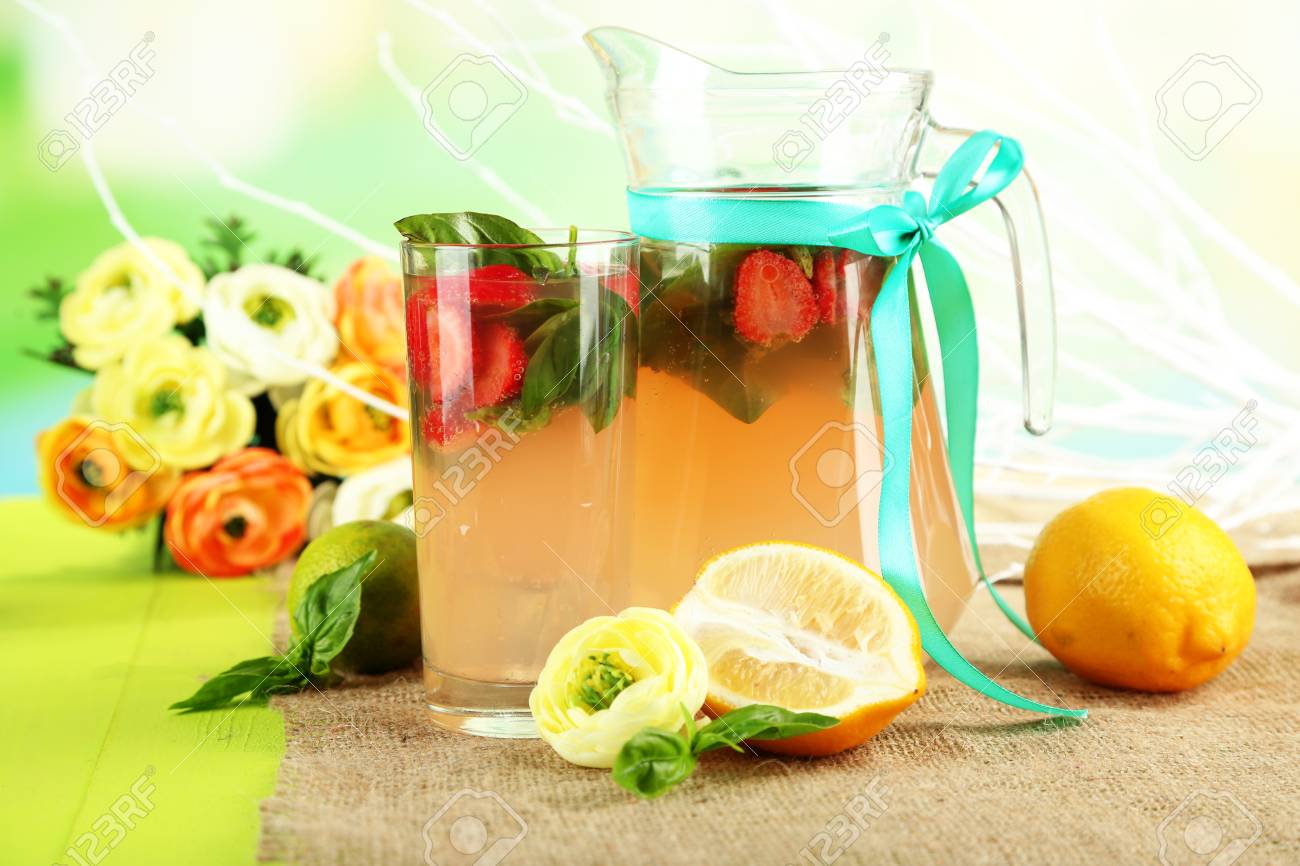 Basil Lemonade With Strawberry In Jug And Glass On Wooden Table Stock Photo Picture And Royalty Free Image Image 22457449