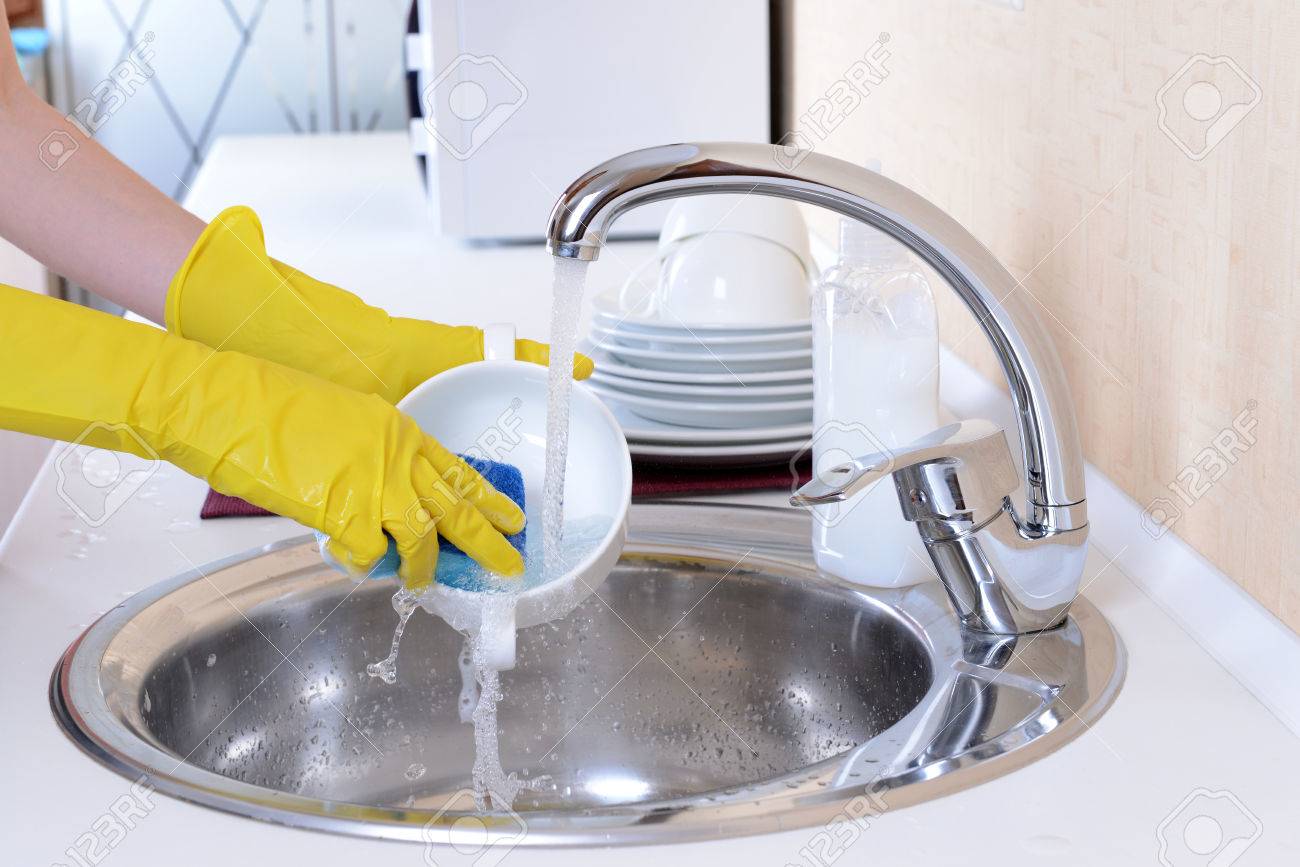 Close Up Hands Of Woman Washing Dishes In Kitchen Stock Photo Picture And Royalty Free Image Image 28954810