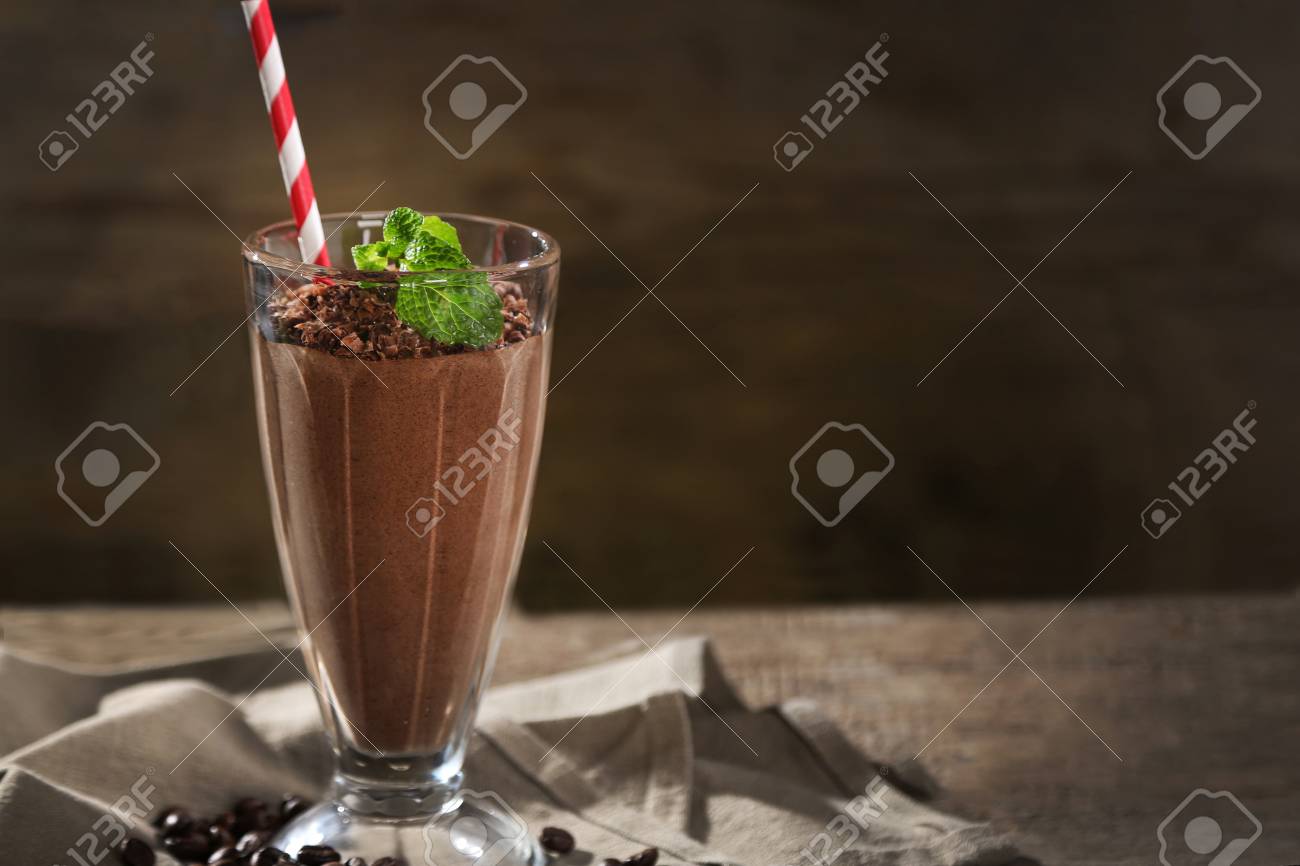 Chocolate cocktail on wooden background - 103237791 Chocolate cocktail on wooden background - 103237791