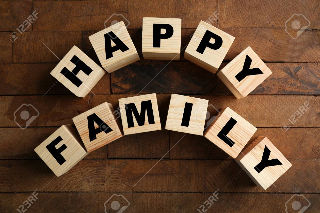 Words HAPPY FAMILY On Wooden Background Stock Photo, Picture and Royalty  Free Image. Image 106567834., image size:1300x866