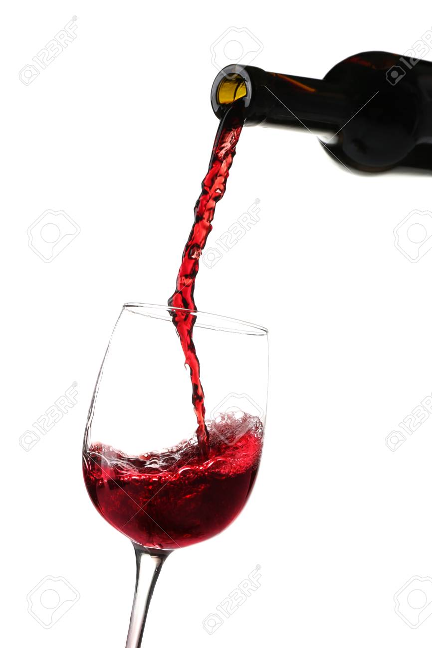 red wine pouring into glass on white background stock photo picture