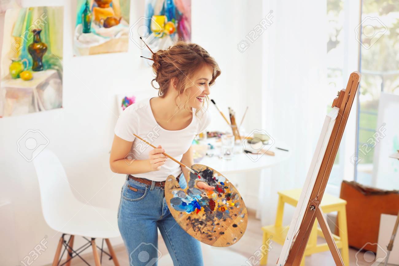 Young Female Artist Painting Picture In Studio Stock Photo, Picture and  Royalty Free Image. Image 109569531., image size:1300x866