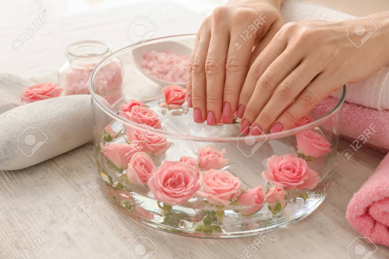 Young Woman Undergoing Spa Manicure 