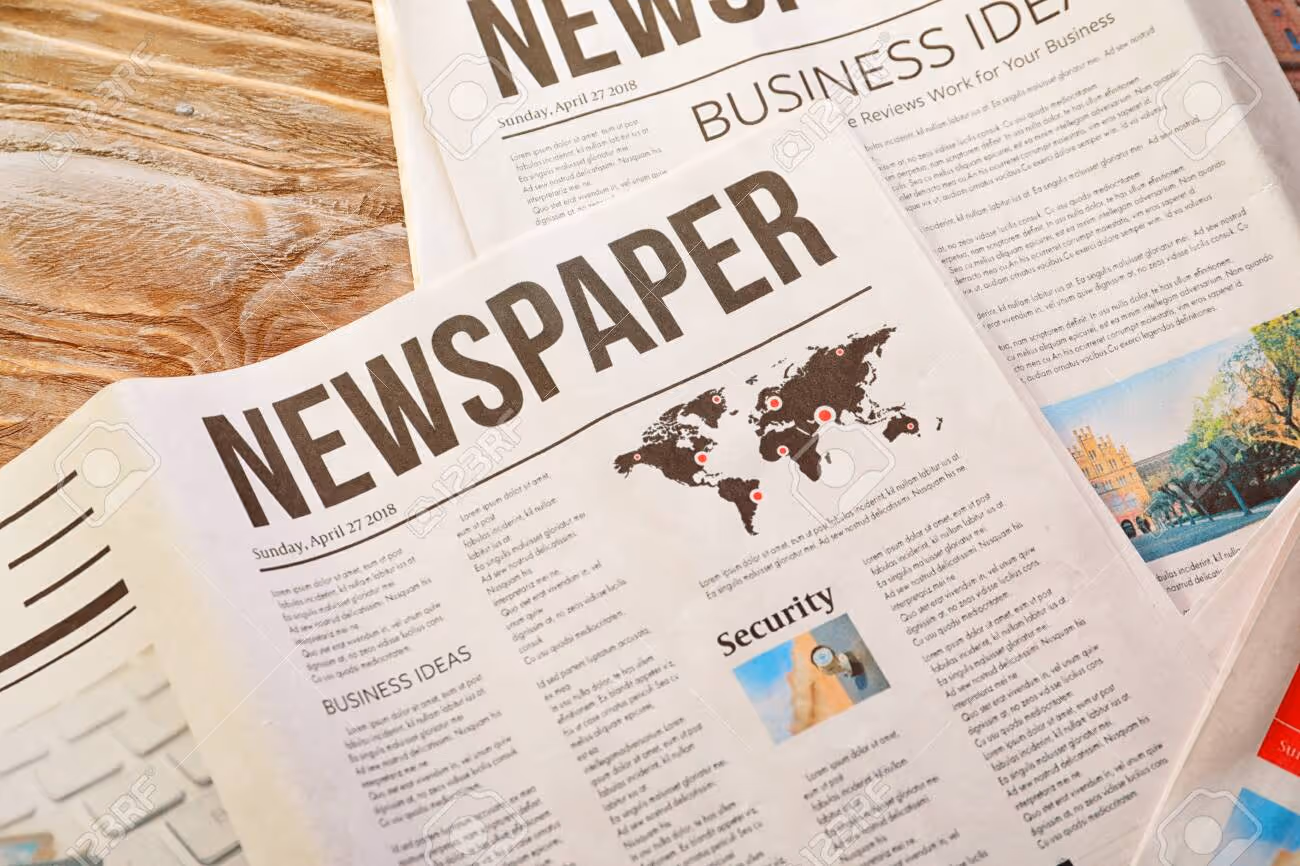 Newspapers on table - 113165373 Newspapers on table - 113165373