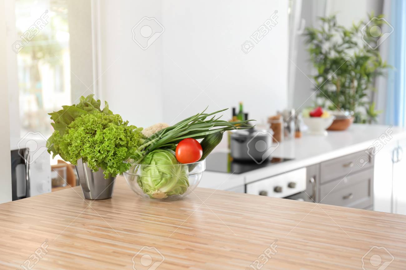 Fresh vegetables on wooden table in kitchen - 114621840 Fresh vegetables on wooden table in kitchen - 114621840