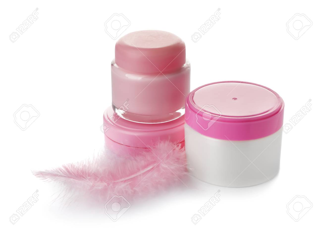 Jars with body cream and pink feather on white background - 116097494 Jars with body cream and pink feather on white background - 116097494