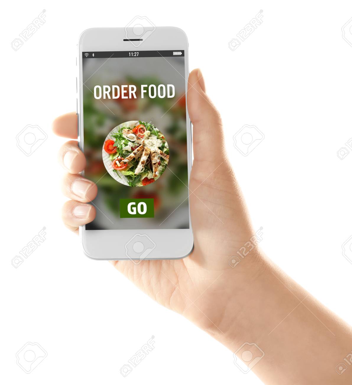 Woman holding mobile phone with open page of food delivery service on white background - 115863798 Woman holding mobile phone with open page of food delivery service on white background - 115863798