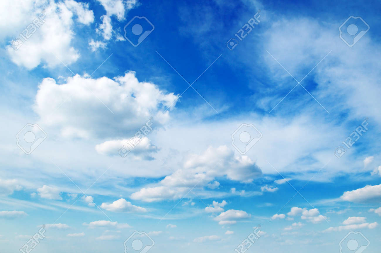 white fluffy clouds in the blue sky stock photo picture and royalty