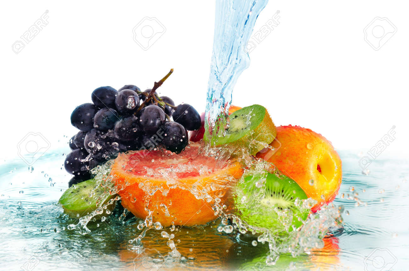fruit in a spray of water isolated on a white background - 12740121 fruit in a spray of water isolated on a white background - 12740121