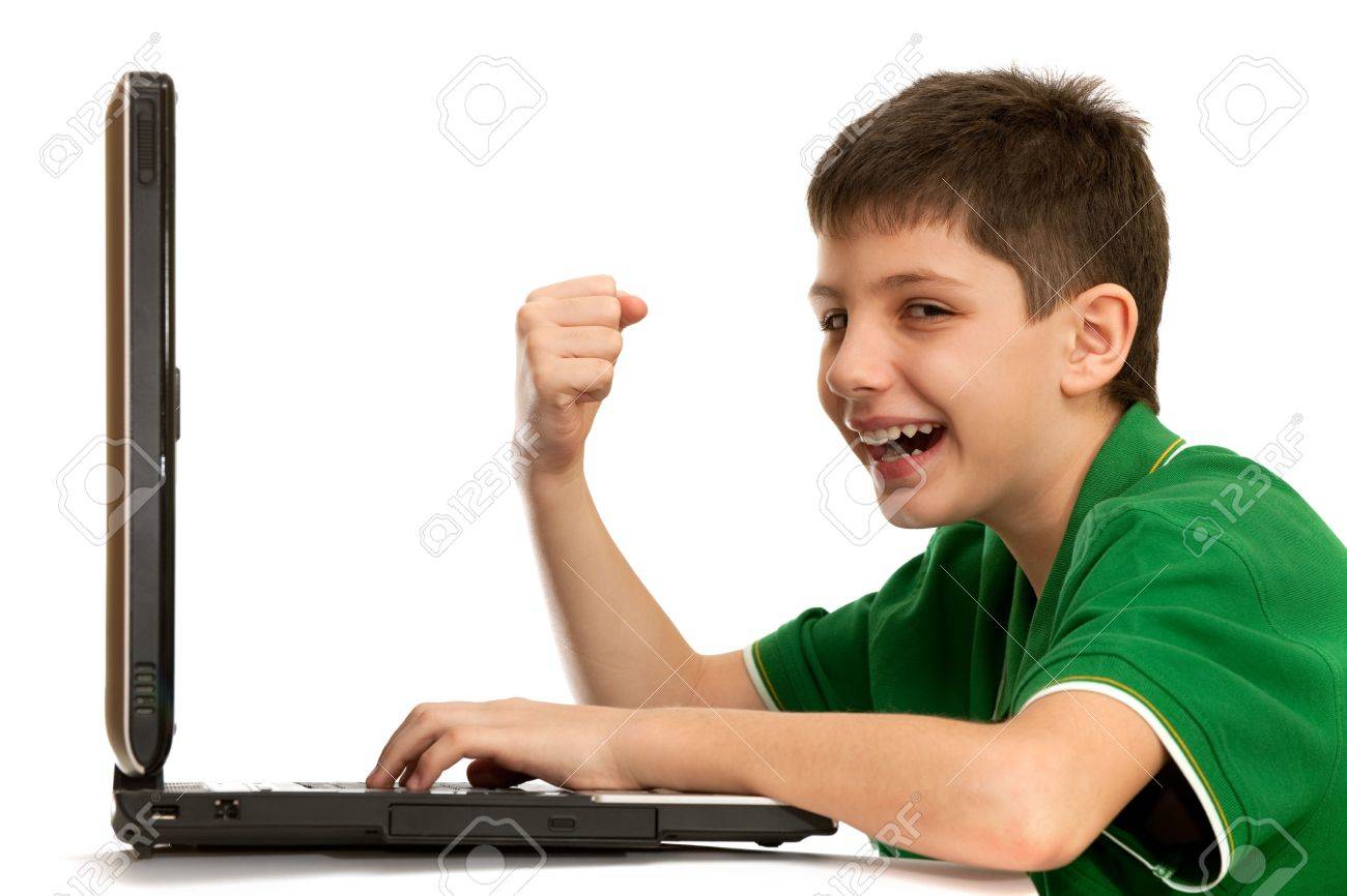 An Emotional Kid Is Playing A Computer Game; Isolated On The White  Background Stock Photo, Picture And Royalty Free Image. Image 6436942.