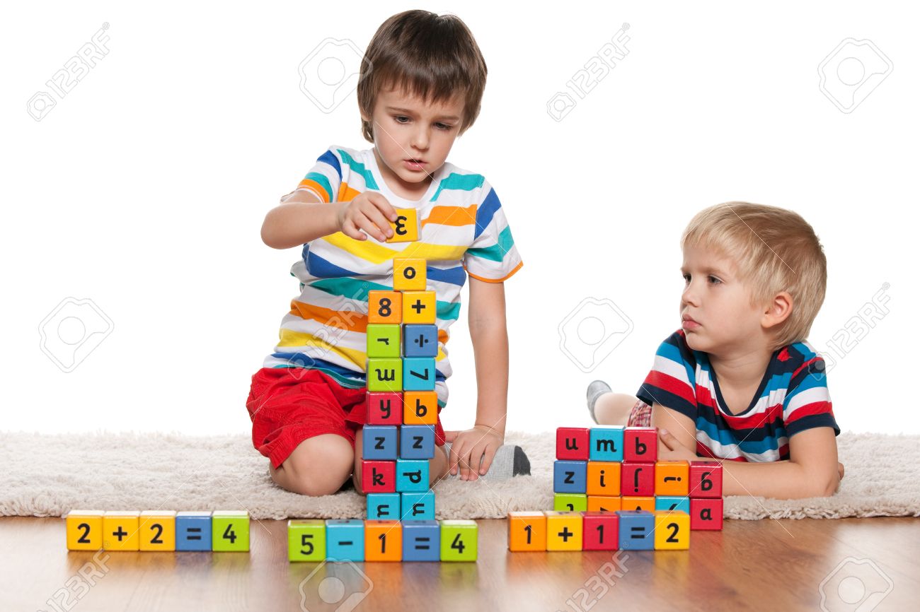 boy playing with blocks