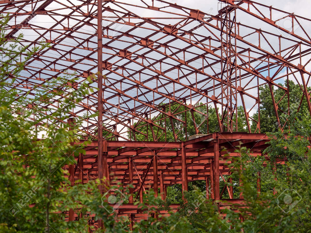 Construction of a huge red frame for a shopping center near the city. - 149743992 Construction of a huge red frame for a shopping center near the city. - 149743992