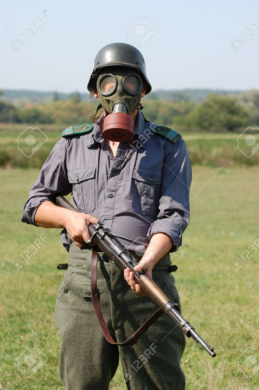German Soldier In Gas Mask. WW2 Reenacting Stock Photo, Picture And Royalty  Free Image. Image 7811327.
