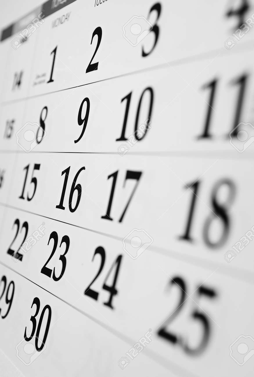 Calendar with dates viewed at an oblique angle with shallow dof - 30977209 Calendar with dates viewed at an oblique angle with shallow dof - 30977209