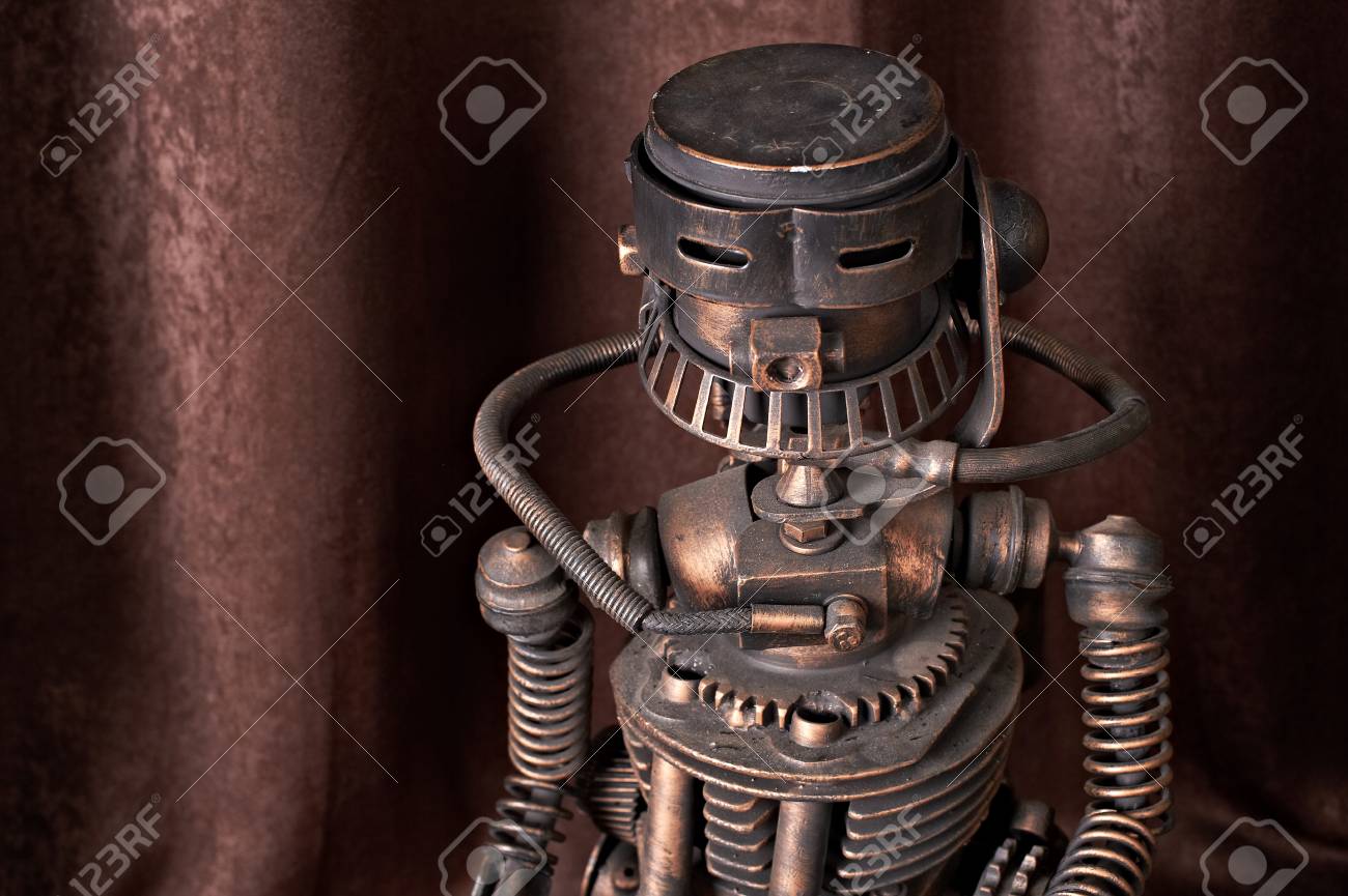 茶色の背景に古い機械ロボット の写真素材 画像素材 Image