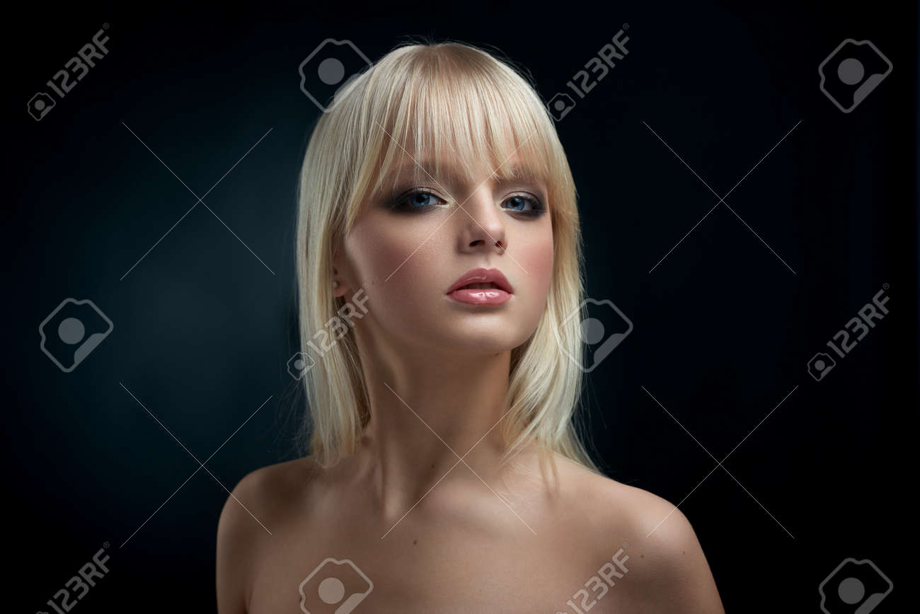 Frontview Of Young Model With Blonde Hair And Short Haircut With