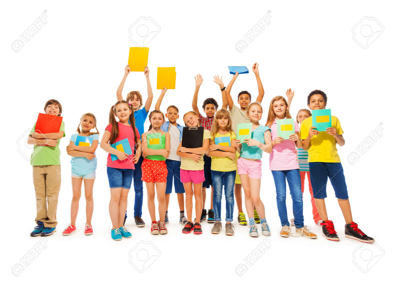 Large group of school kid standing with notebooks in fool body length smiling wearing colorful t-shirts - 44285327 Large group of school kid standing with notebooks in fool body length smiling wearing colorful t-shirts - 44285327