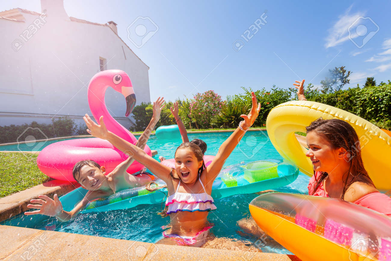 Girl Playing Games With Friends During Pool Party Stock Photo Picture And Royalty Free Image Image 114532760