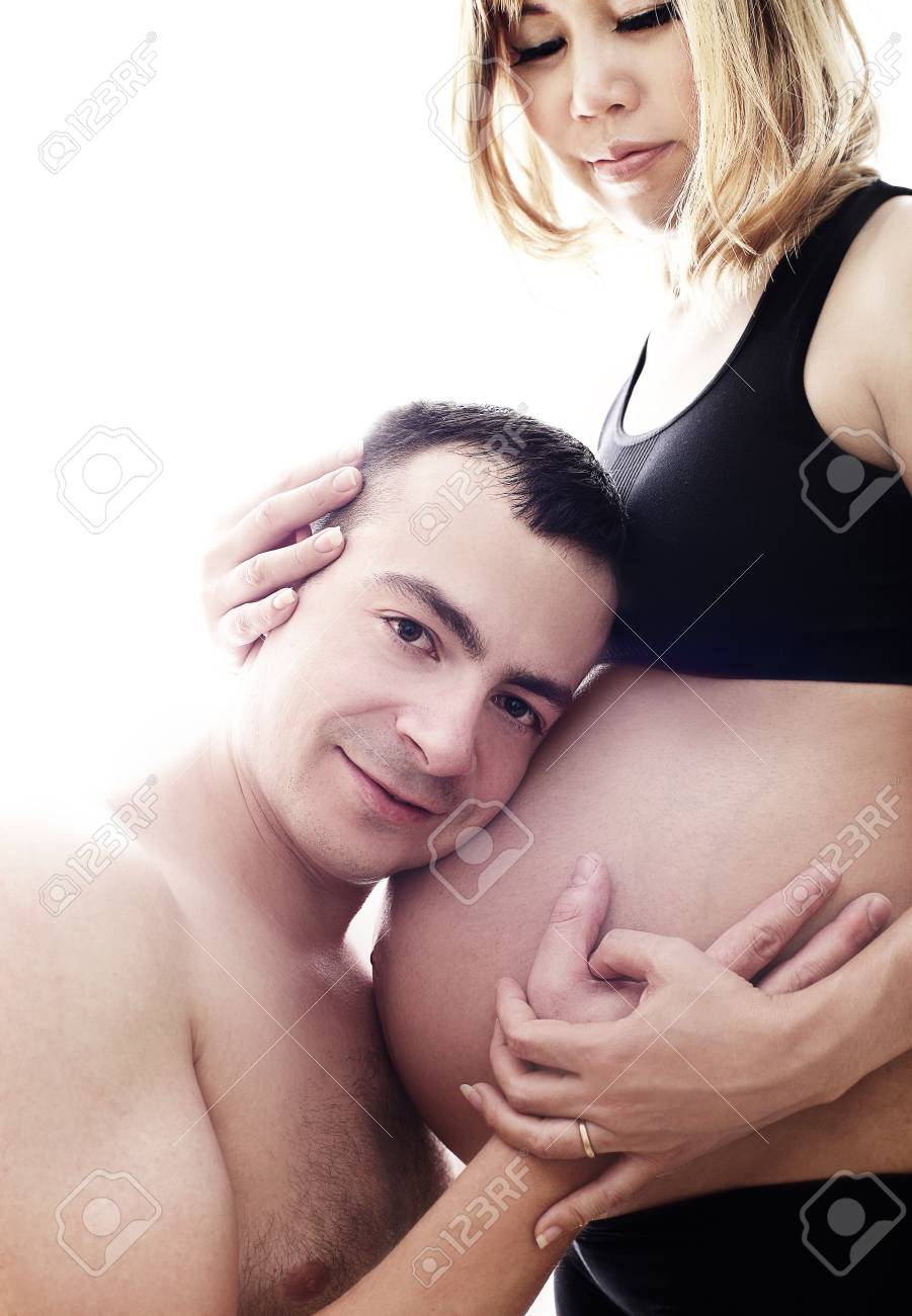 His Pregnant Asian Wife Isolated photo