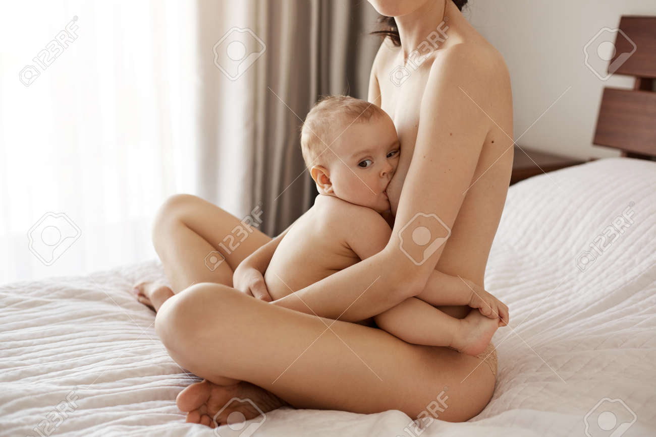Mom bed nude Young Attractive Nude Mom Breastfeeding Hugging Her Newborn Baby Smiling  Sitting On Bed At Home. Stock Photo, Picture and Royalty Free Image. Image  81214921.