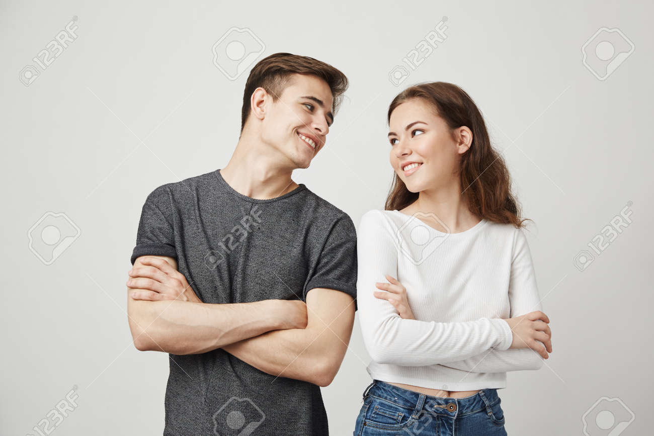 Lovely Couple Looking At Each Other With Crossed Hands While Stock Photo Picture And Royalty Free Image Image 93878517