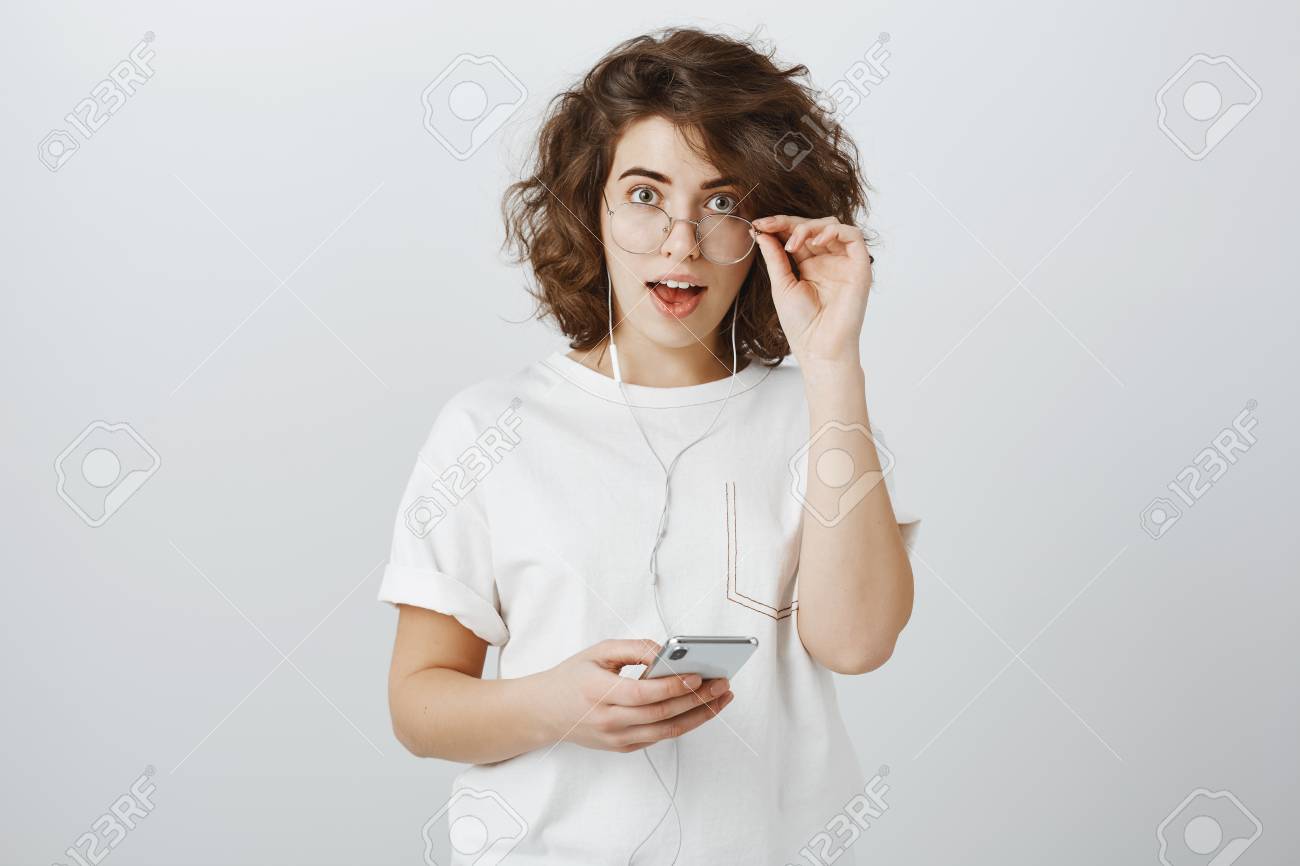 Portrait Of Curious Amazed Beautiful European Woman With Short