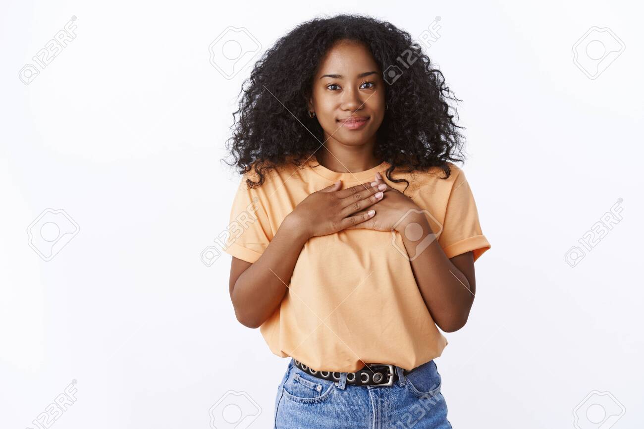 Lovely Young African American Girl With Curly Haircut Press