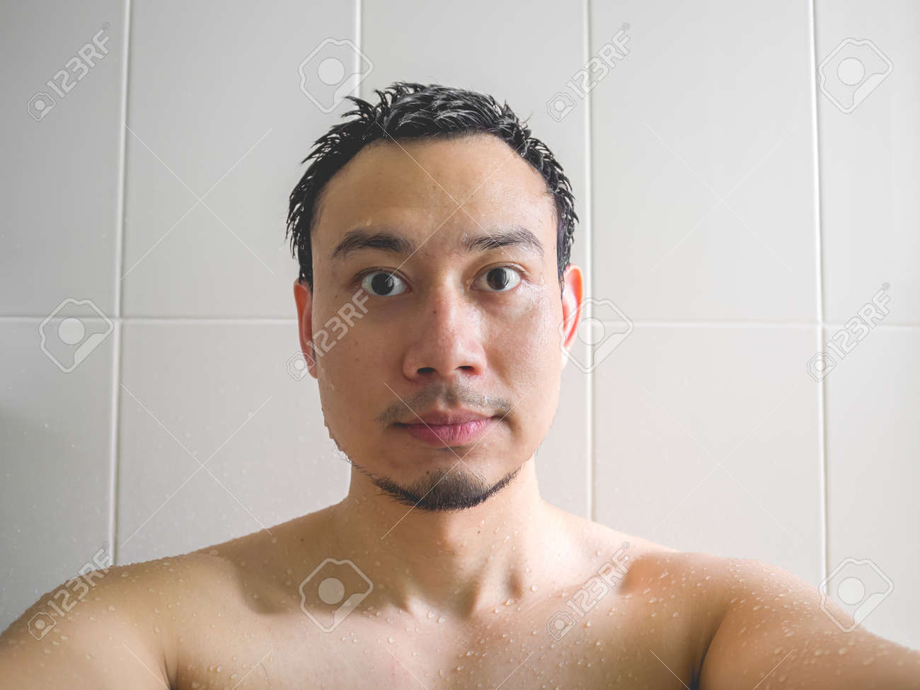 Asian Man Take A Selfie Shot In The Bathroom While Having Bath Stock Photo,  Picture and Royalty Free Image. Image 85001051., image size:1300x975