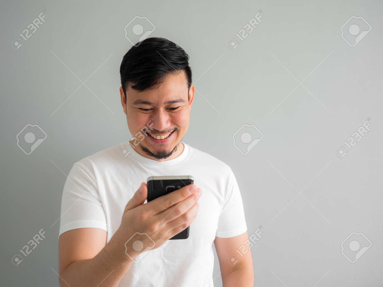 Funny Laugh Face Of Asian Man Watching