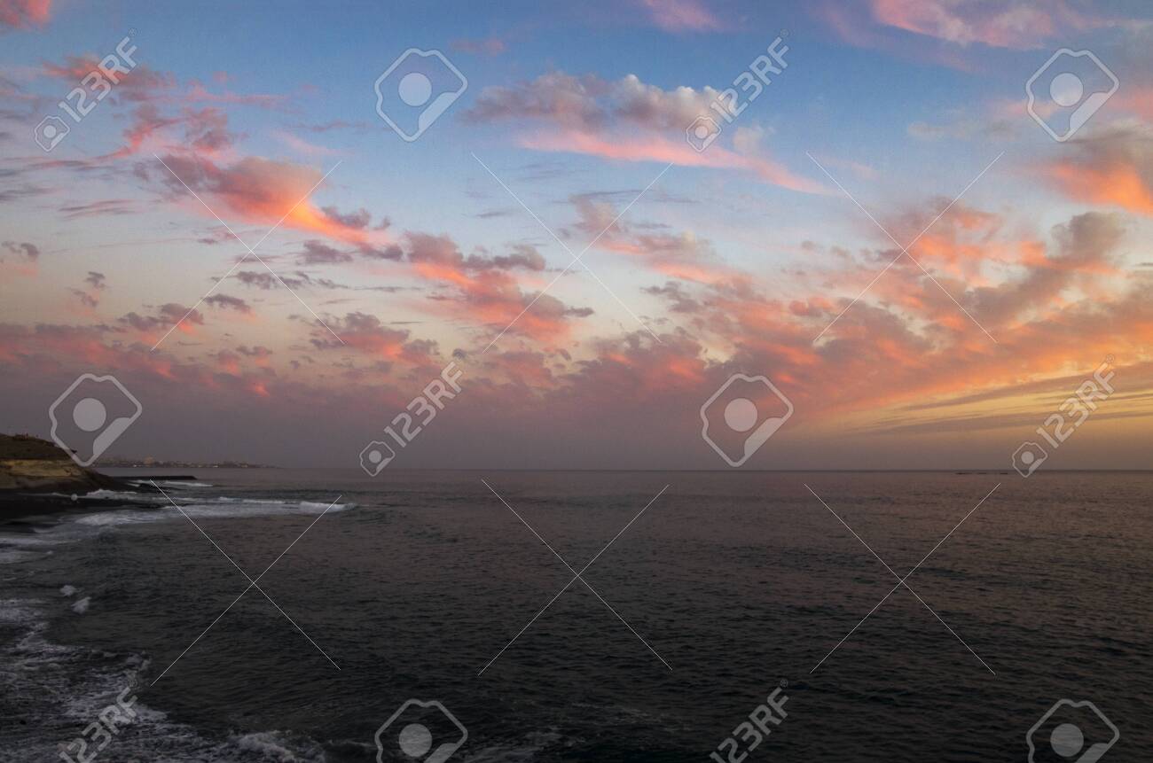 Colorful sunset on the coast of the Canary Islands, landscape - 136890388 Colorful sunset on the coast of the Canary Islands, landscape - 136890388
