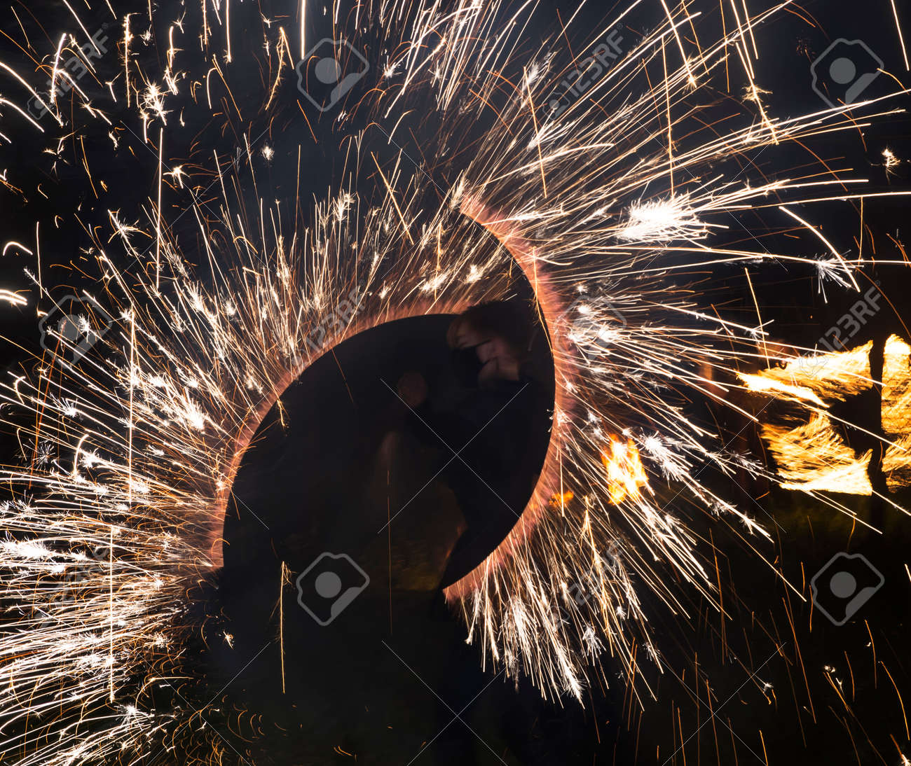 Colorful fire show of lights in the dark, background - 158440007 Colorful fire show of lights in the dark, background - 158440007