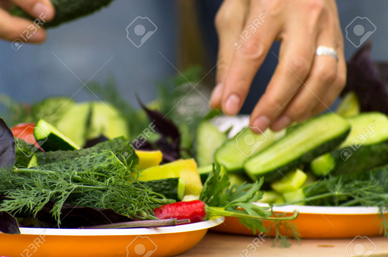 Cutting vegetables and arranging them into plates - 159935177 Cutting vegetables and arranging them into plates - 159935177