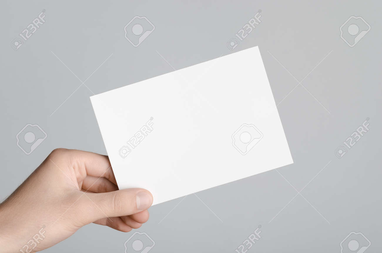 Download A6 Flyer Postcard Invitation Mock Up Male Hands Holding Stock Photo Picture And Royalty Free Image Image 68189075