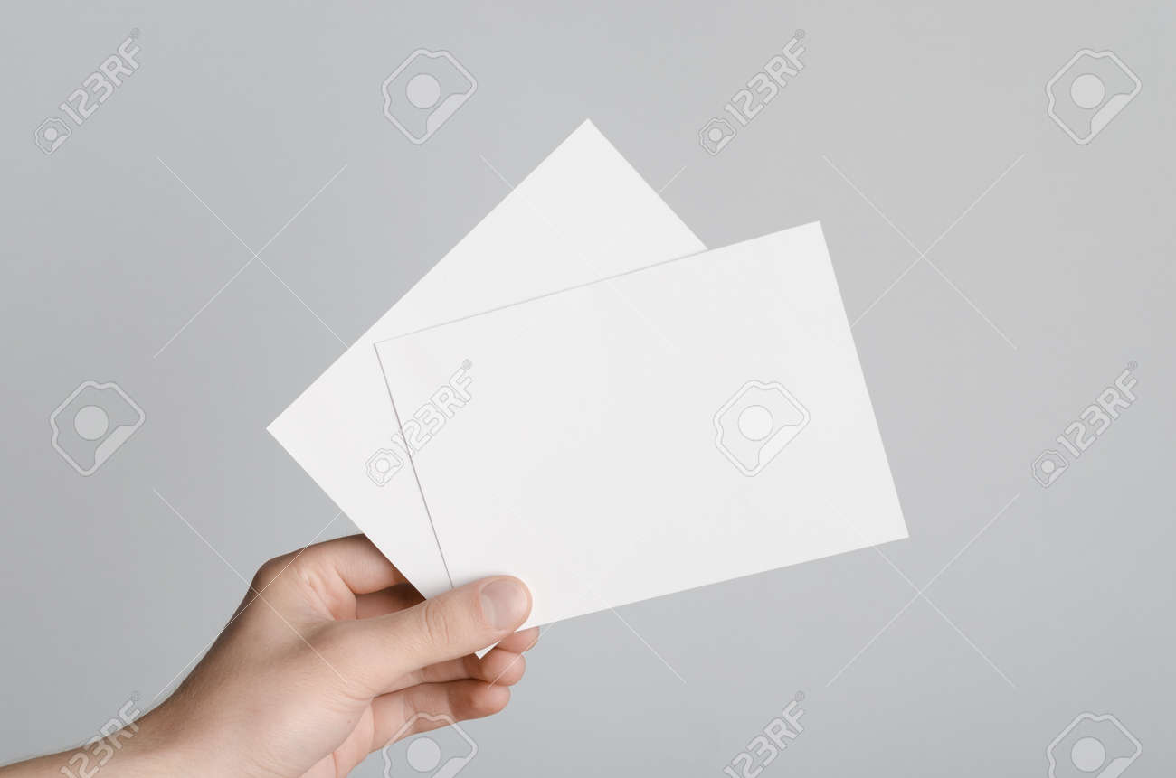 a6 flyer postcard invitation mock up male hands holding blank flyers