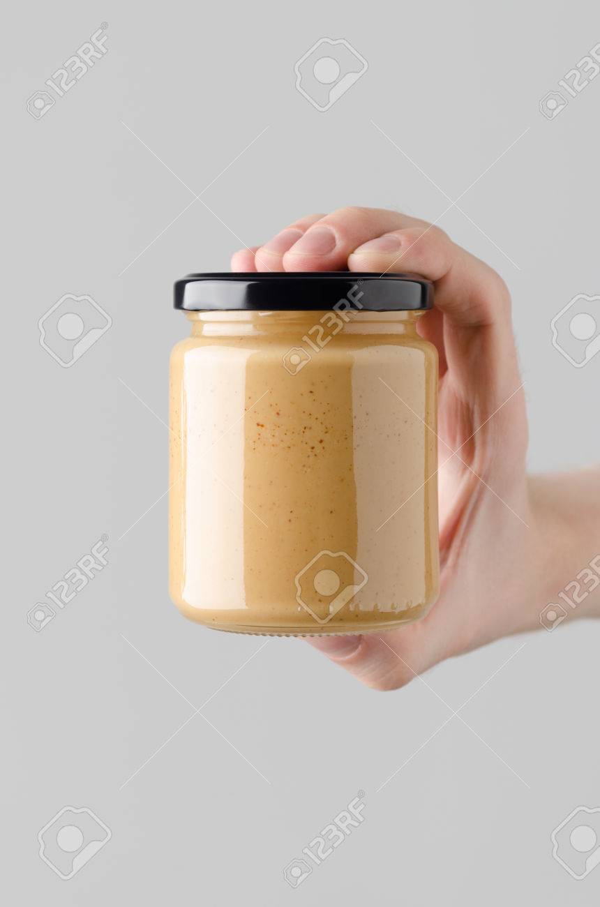 Download Peanut Almond Nut Butter Jar Mock Up Male Hands Holding Stock Photo Picture And Royalty Free Image Image 82082921