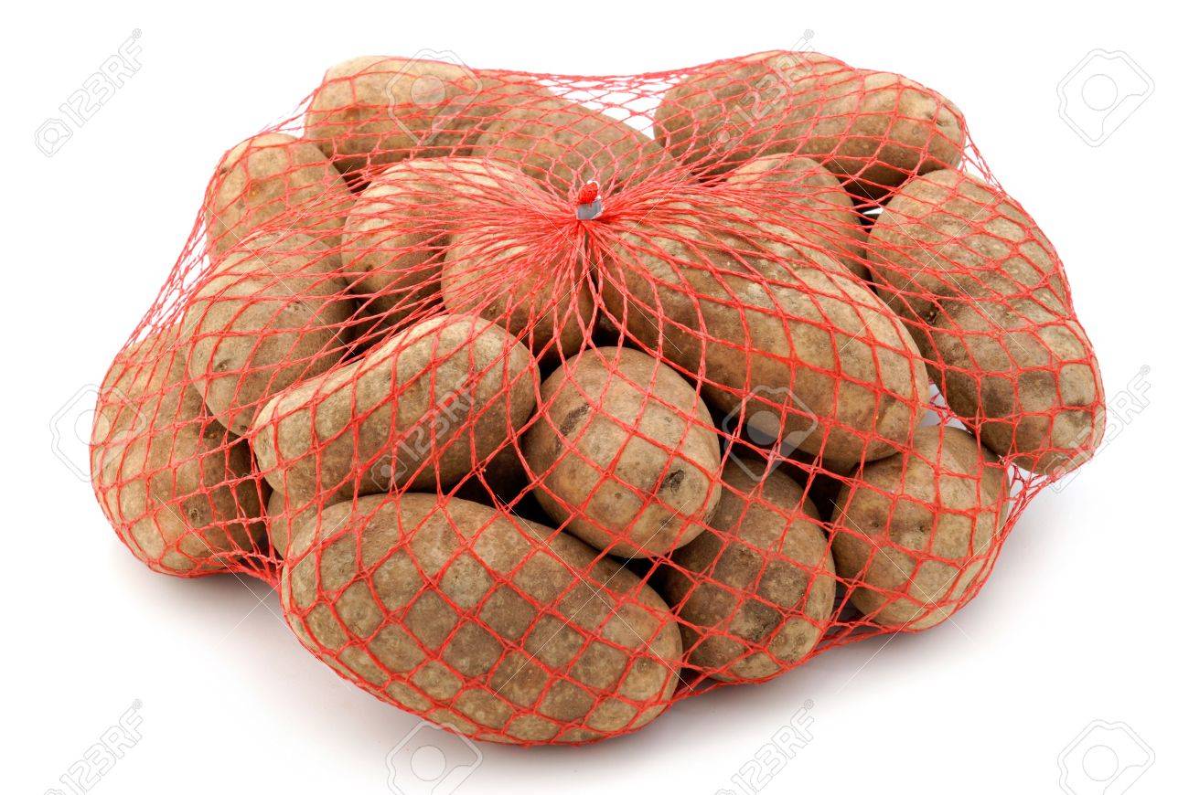 A Red Mesh Bag Of Russet Potatoes Stock Photo A Red Mesh Bag Of Russet Potatoes Stock Photo