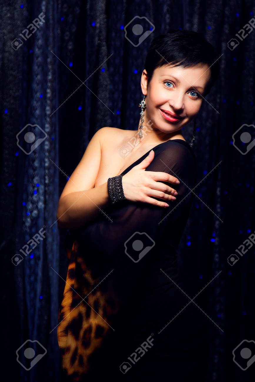 Portrait Of Young Brunette Woman With Short Hair And Holiday