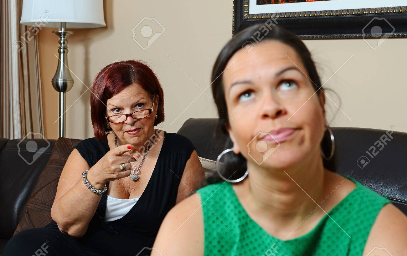 Image of a mother looking angry at her daughter - 14493906 Image of a mother looking angry at her daughter - 14493906