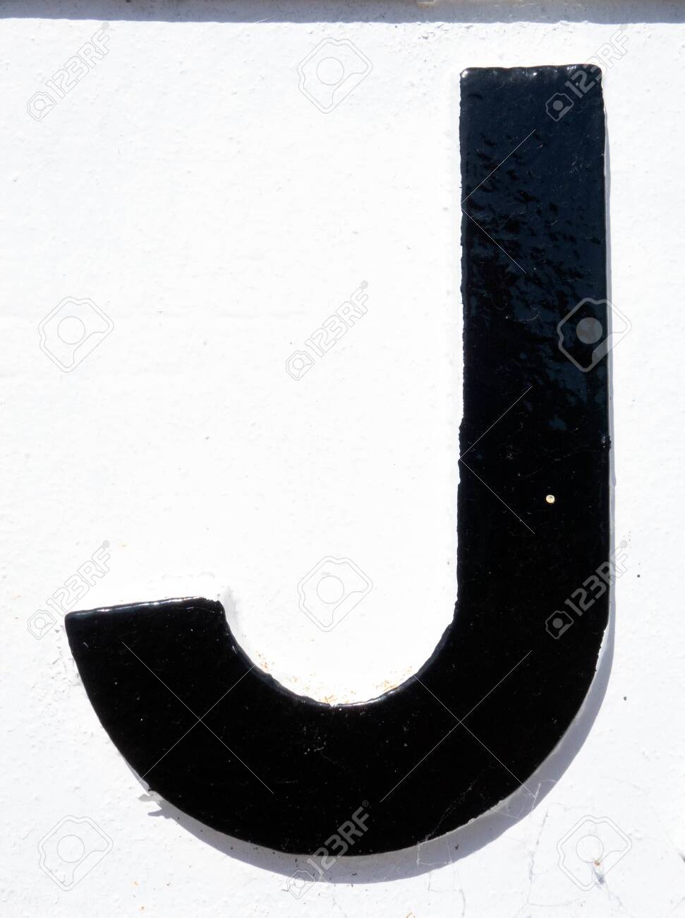 Written Wording in Distressed State Typography Found Letter J - 148615084 Written Wording in Distressed State Typography Found Letter J - 148615084