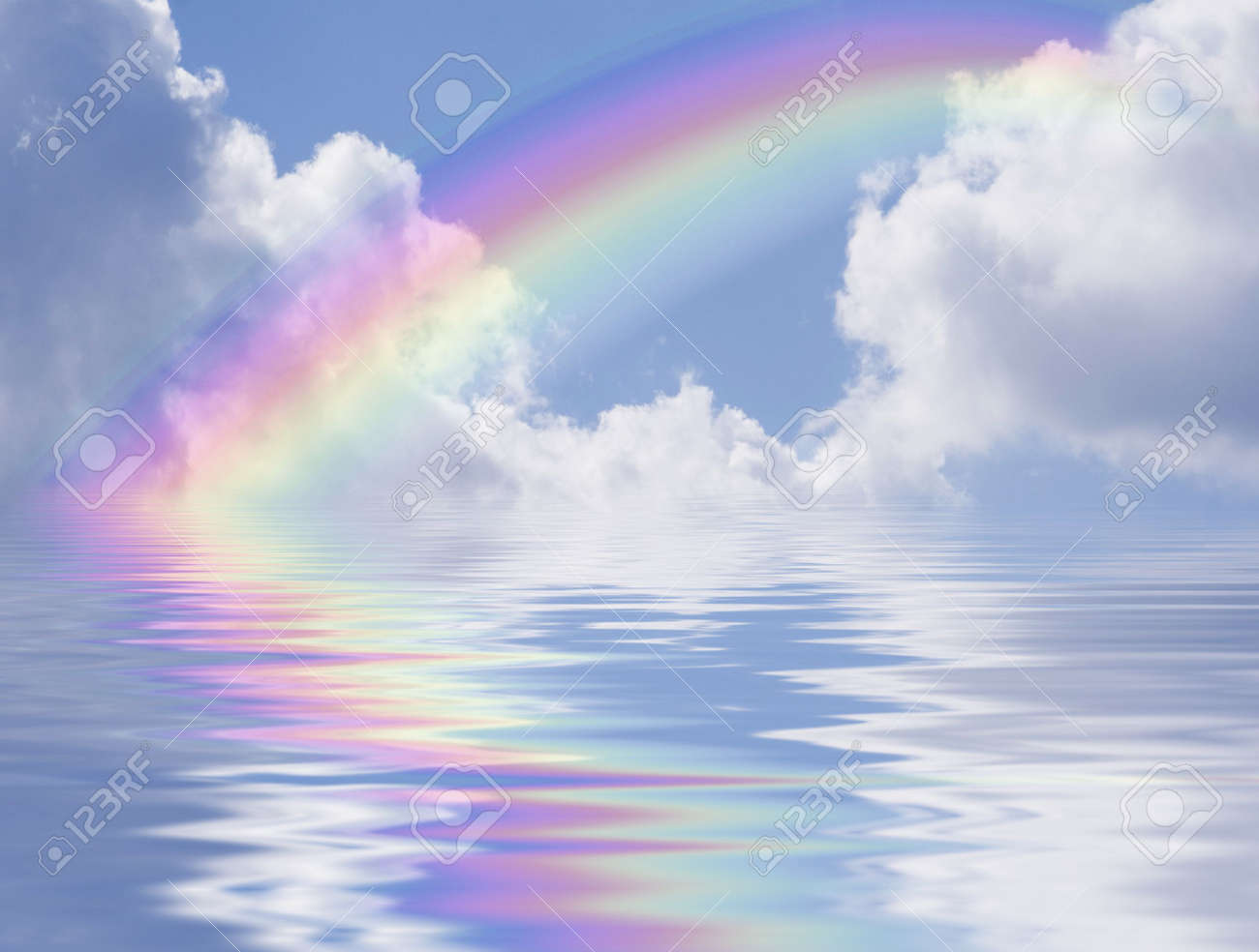 blue sky with rainbow and clouds reflected in the water stock photo