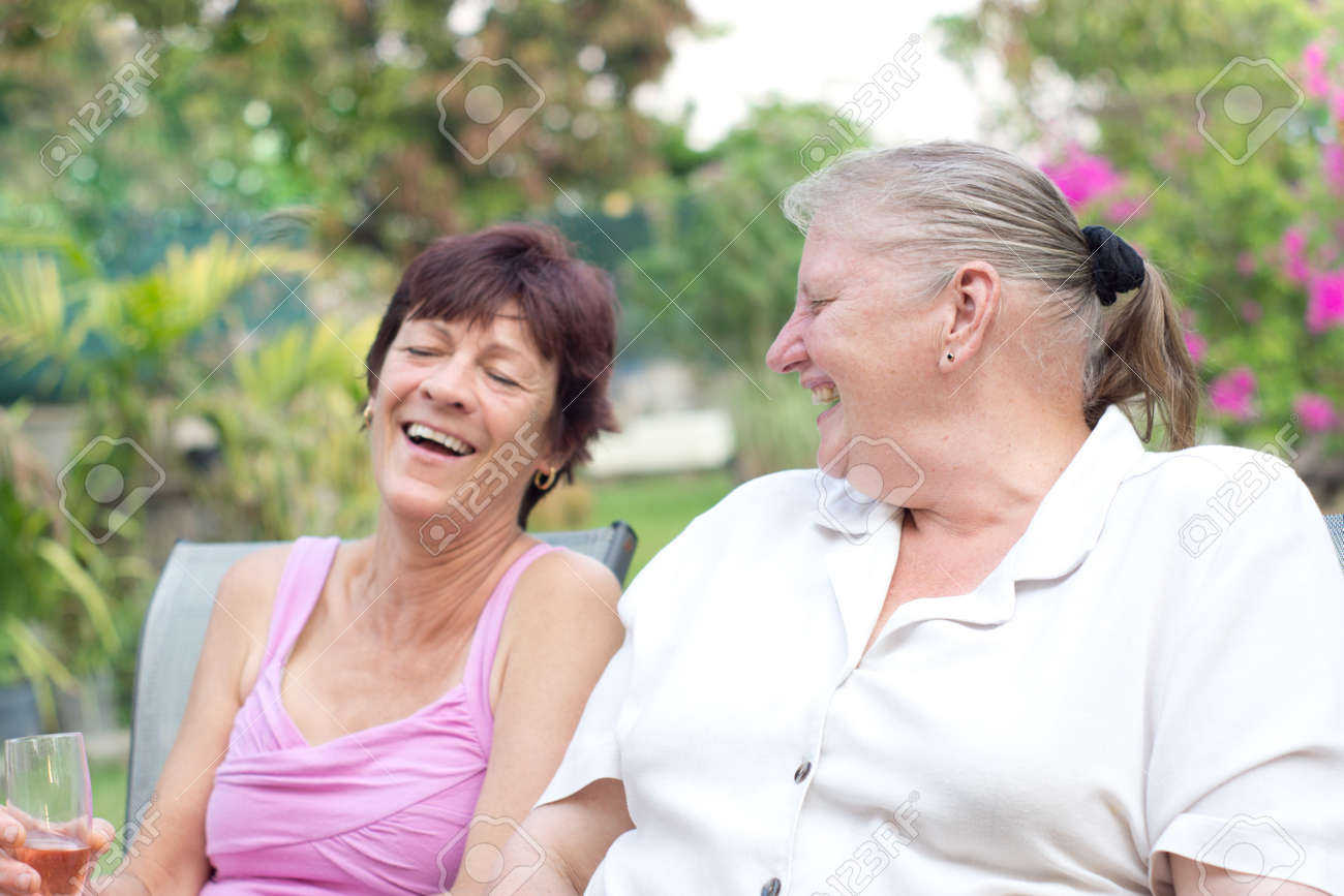 Stock Photo Two Older Women Laughing Having Fun Stock Photo Two Older Women Laughing Having Fun