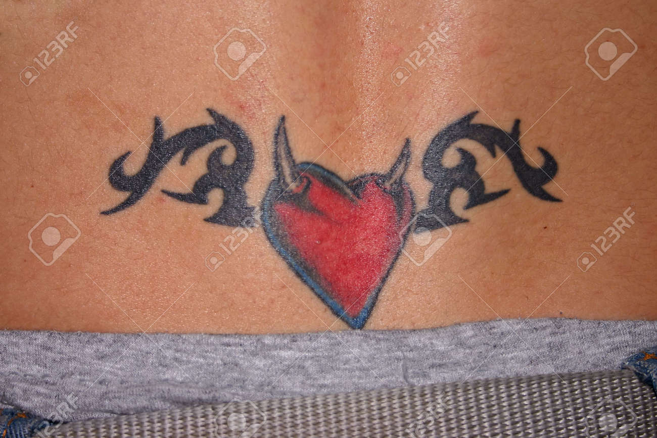 Heart Tattoo on Lower Back: Bold & Beautiful