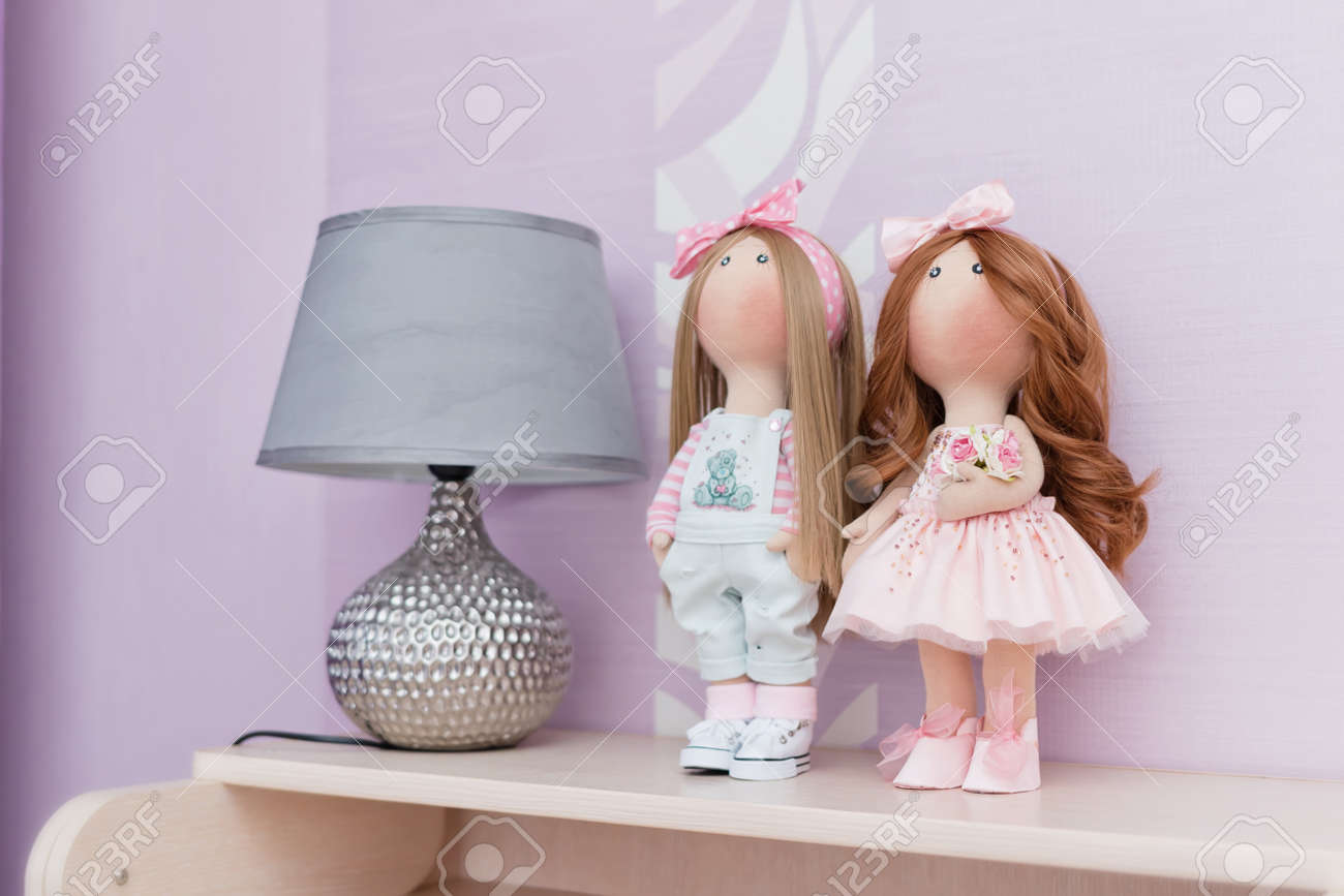 Two Handmade Dolls With Natural Hair Are On The Nightstand Next Stock Photo Picture And Royalty Free Image Image 81941715