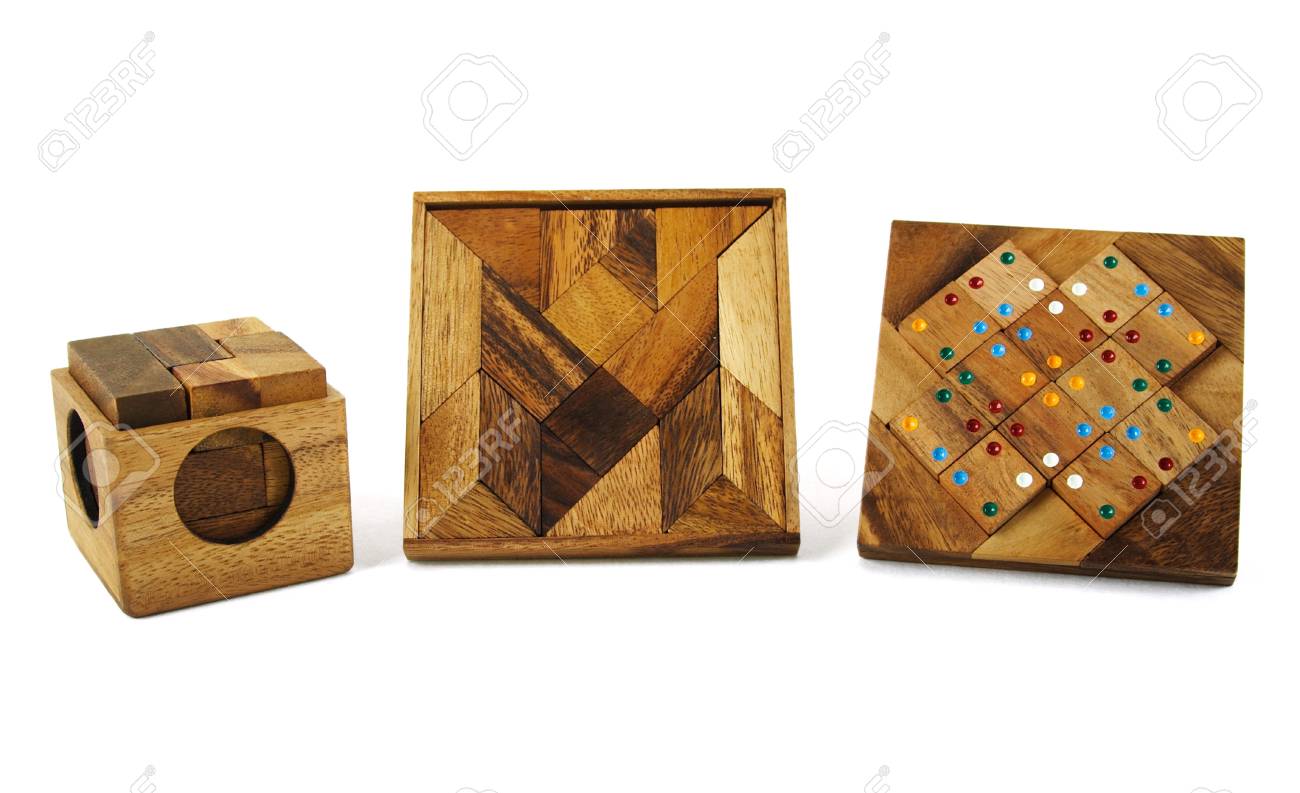 three wooden puzzles