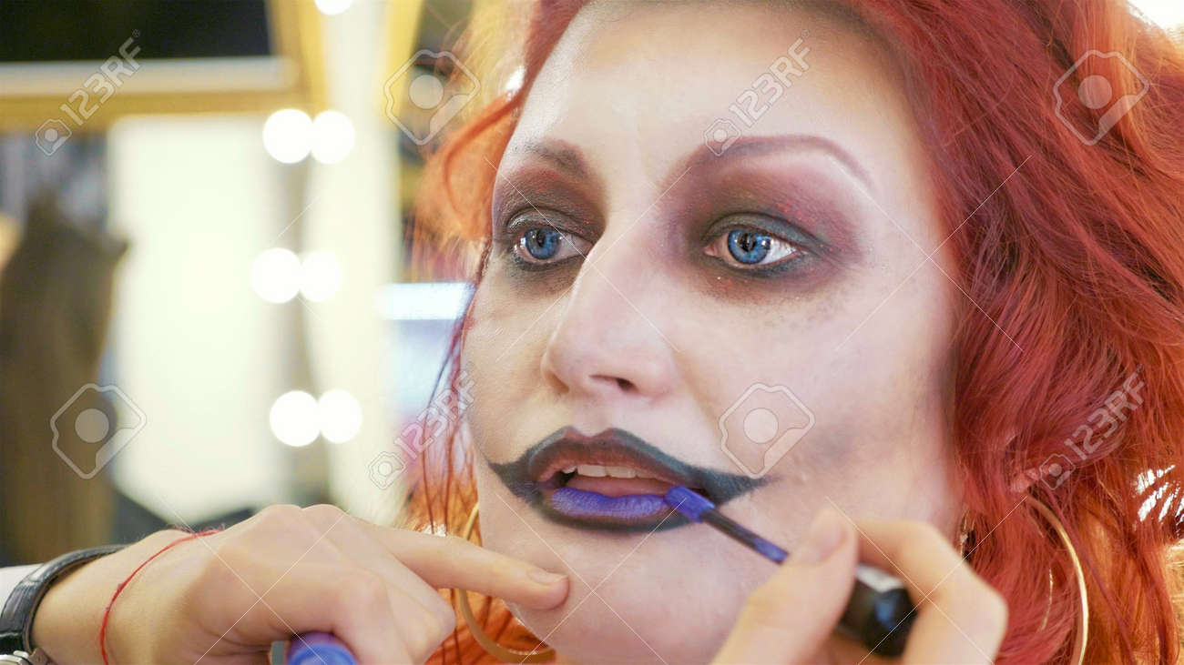Process Applying Halloween Makeup On Face The Redhead Woman In