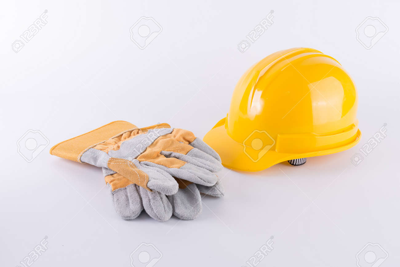 Download Yellow Safety Helmet And Safety Gloves On White Background Hard Stock Photo Picture And Royalty Free Image Image 92801832 Yellowimages Mockups