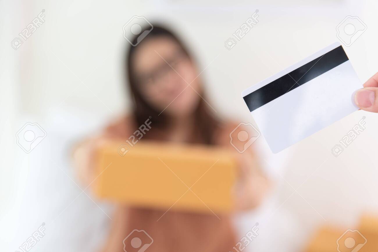 Close Up Of Credit Card With Woman Entrepreneur And Parcel Box Stock Photo Picture And Royalty Free Image Image 138255019