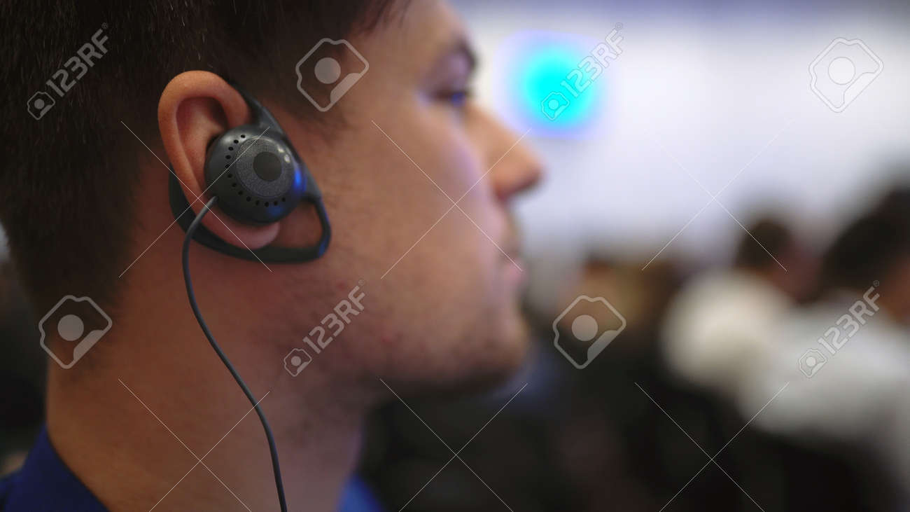 Audience business meeting crowded forum person. Viewer seminar listen earphone speaker auditorium. Event political summit business man spectator. Group people listening translate speech crowd audience - 156009739 Audience business meeting crowded forum person. Viewer seminar listen earphone speaker auditorium. Event political summit business man spectator. Group people listening translate speech crowd audience - 156009739