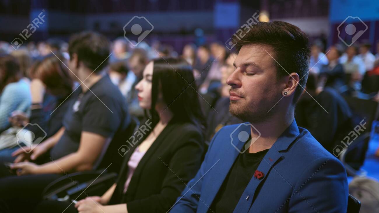 Person yawn at business meet boring lecture speaker. Crowded audience asleep. Expressive face sleeping business man on forum. People emotion yawning at conference. Auditorium sleep tired from insomnia - 156059397 Person yawn at business meet boring lecture speaker. Crowded audience asleep. Expressive face sleeping business man on forum. People emotion yawning at conference. Auditorium sleep tired from insomnia - 156059397