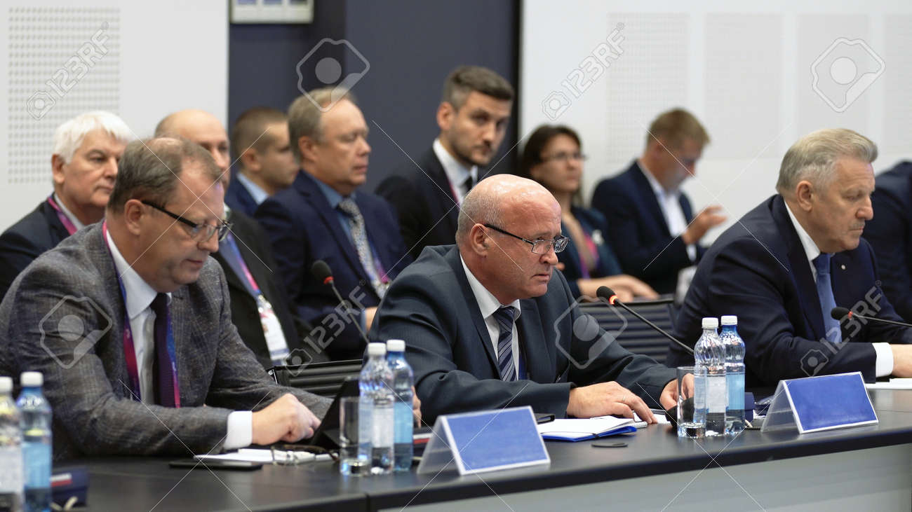 Russia, Novosibirsk, 21 sep, 2019: Speaker summit talk speech. Political discusses problems. Round table international nations. Politician talk in mic. Speech adult speaker at summit. Audience talking - 156208841 Russia, Novosibirsk, 21 sep, 2019: Speaker summit talk speech. Political discusses problems. Round table international nations. Politician talk in mic. Speech adult speaker at summit. Audience talking - 156208841